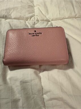 kate spade pink pebbled leather zip-around wallet
